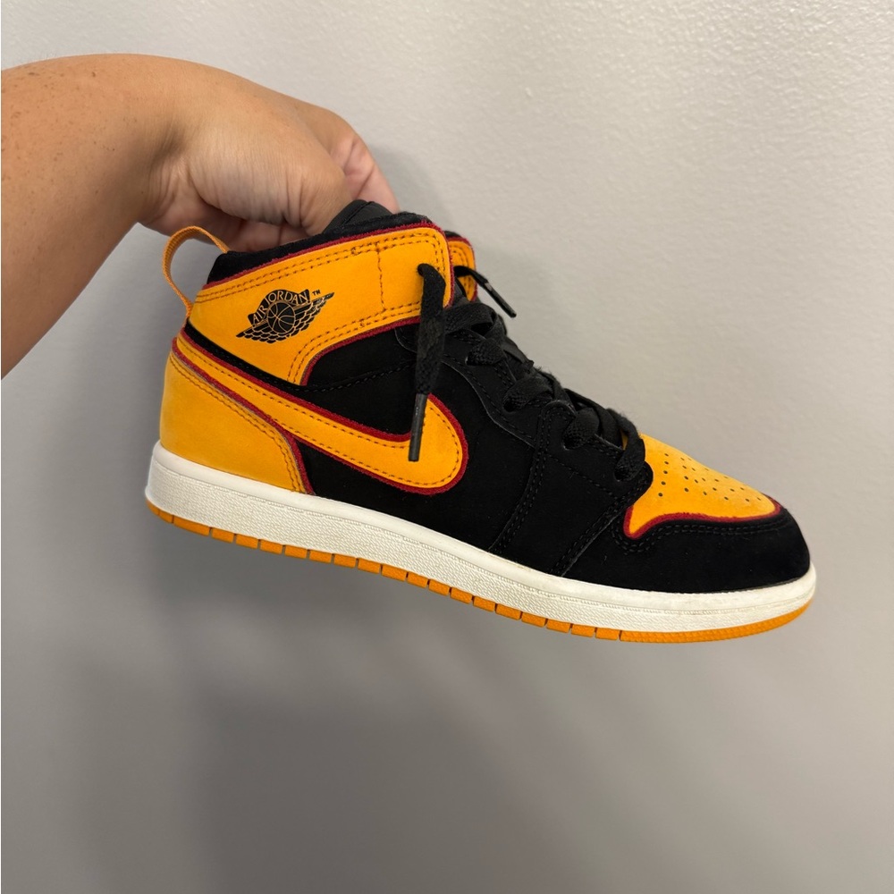 Air Jordan Black and Orange Sneakers